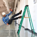 Construction worker falling off the ladder