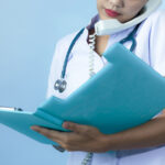 female-physician-holding-a-file