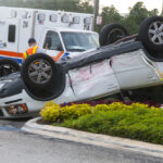 White car rolled over