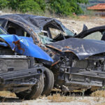 Cars parked on the side of the road after a Multiple Car crash